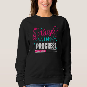Sjuksköterskor som arbetar med att sjuksköterska i t shirt