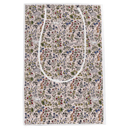 Sjukvårdsdjur millus flyr från rosa presentsäck