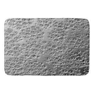 Skadad silver metall badrumsmatta