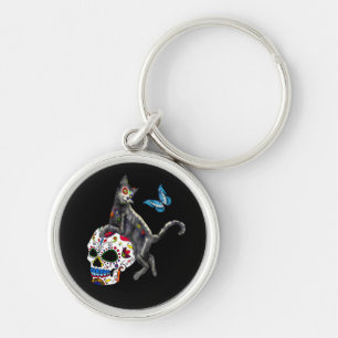 Skal och fjäril av day of the dead rund silverfärgad nyckelring