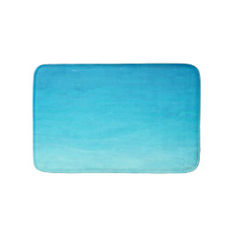 Skalat blått vatten på badmatt badrumsmatta