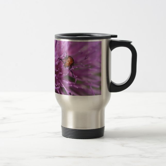 Skalbagge på en mjölkThistle Resemugg (Höger)