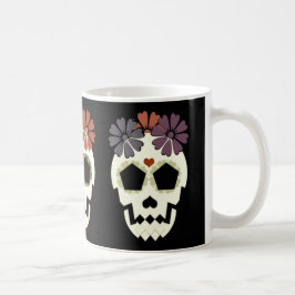Skalle med blommamuggen kaffemugg