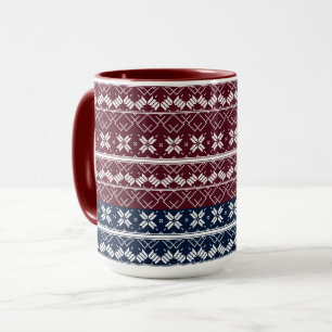 Skandinavisk ornament på en blå, vinröd mugg