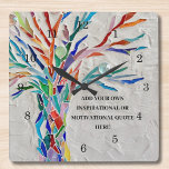 Skapa en egen inspirationskälla/Motiv citat Fyrkantig Klocka<br><div class="desc">Den här unika vägglåset har en färgstark mosaik Livets träd-design. Lägg till det valda offertet för att anpassa det. Klicka på Anpassa ytterligare om du vill redigera teckensnitt,  storleka teckensnitt och teckensnitt i färg. Original Mosaic © Michele Davies.</div>
