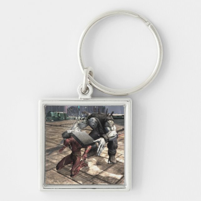 Skärmbild: Flash vs Grundy 2 Fyrkantig Silverfärgad Nyckelring (Framsidan)