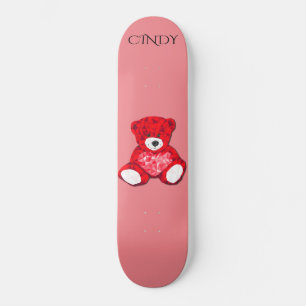Skateboard med röd nalle, eget namn.