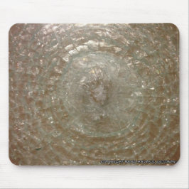 Skatterat glas på en musmatta