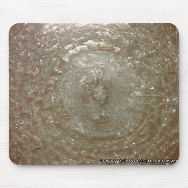 Skatterat glas på en musmatta (Framsidan)