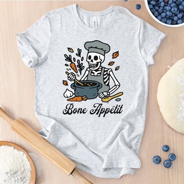 Skeleton Chef Halloween - Spooky Cooking T Shirt (Shirt featuring a happy skeleton chef cooking up a pot of soup. )