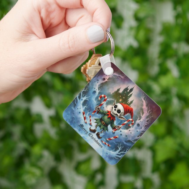 Skeleton Christmas Elf – Creepy Cute Dark Holiday  Nyckelring (Hand)