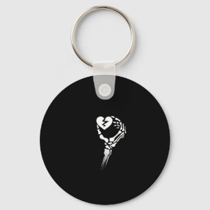 Skeleton Hand Holding Heart Nyckelring