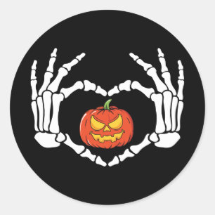 Skeleton Händer med Pumpkin Sticker Runt Klistermärke