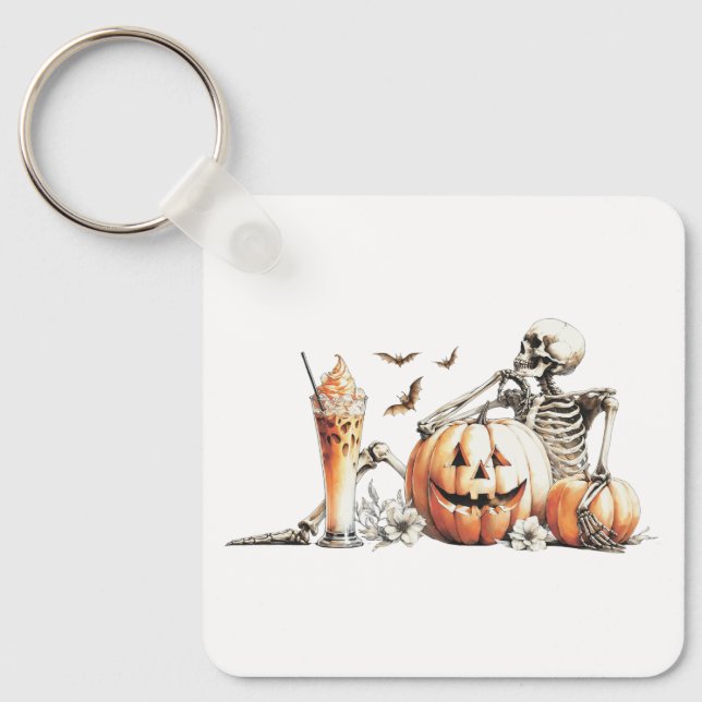 Skeleton med pumpa och dryck. Halloween. Nyckelring (Framsida)