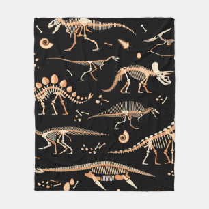 Skeletoner av dinosaurier och fossils mönster fleecefilt