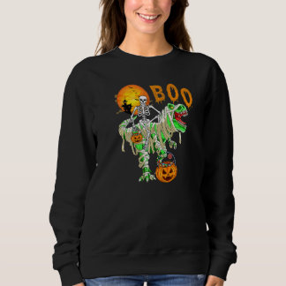 Skelett som rider på Rex-dinosaur Pumpa Halloween T Shirt