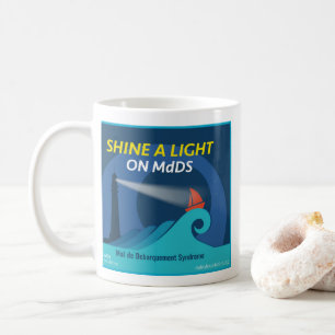Sken ett ljust på den MdDS kaffemuggen Kaffemugg