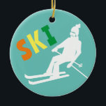 Ski Retro Skier Winter Teal White Julgransprydnad Keramik<br><div class="desc">Coolans vintertema mönster-design för skidåkare. Alperna skidåkning i vintage retro ski kostym. En underbar vintersportgåva till en skidåkare i din vänkrets,  medarbetare eller familj...  roligt.. Bildschemat för visuella skidbilder. Skiers skiddekanter,  Ski-lag,  skidbuss-gåva.</div>