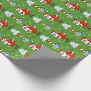 SkidåkningSantas jul som slår in papper Presentpapper