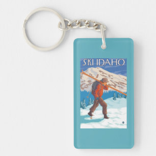 Skidar bärande snö för skieren - Idaho