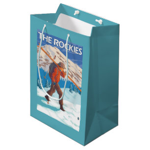 Skidar bärande snö för skieren - Rockiesna