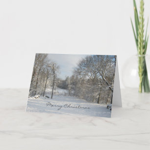 Skogsbevuxet kort för hälsning för jul för
