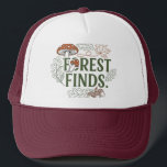 Skogsfenor.t-shirt desigion keps<br><div class="desc">Den här t-shirt-designen innehåller frasen "Forest Finds." i ett lekfullt,  blockerat teckensnitt. Texten omges av charmerande,  handritade illustrationer av inslag som ett svamprum,  akorner och olika löv. Hela designen användor en lång palett med flera färg och skapar en mysigt och rustik perfekt för vilken typ som helst älskare.</div>