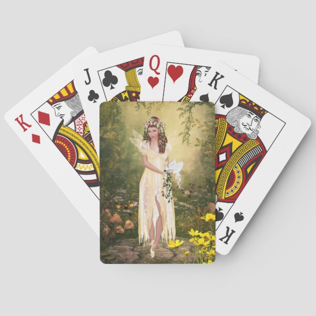 Skogsmarkfe som leker kort spelkort (Baksidan)