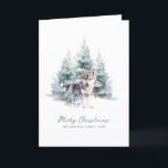 Skogsskogens Varg i Gräs, God jul, påsatt Helgkort<br><div class="desc">En varg i baby ligger i en vinterskog i gräs. God jul är skrivet i ett enkelt skript nedan,  med ytterligare en rad nedan för att anpassa åtgärden ytterligare. All text på det här kortet kan redigeras. Det finns ett julmeddelande som du kan anpassa dig till på baksidan.</div>