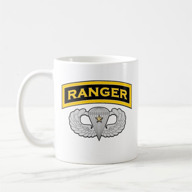 Skogsvaktareflik - hoppvingar - strid kaffemugg (Vänster)