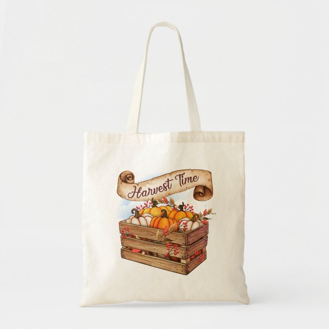 Skördetid Tygkasse (A beautifully designed tote bag featuring a wooden crate filled with vibrant pumpkins!)