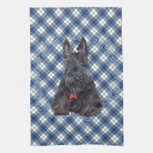 Skotsk terrier på tartan kökshandduk