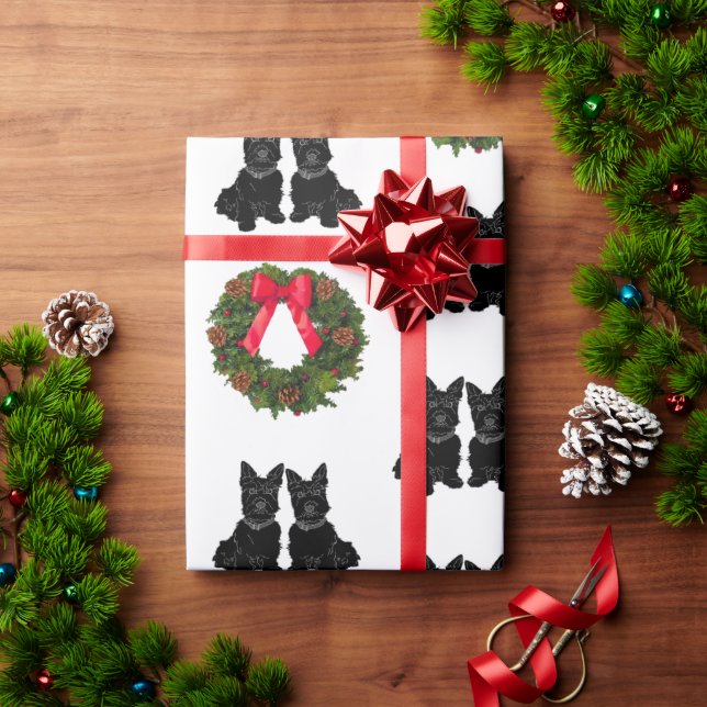 Skotska terrier med julkrans presentpapper (Julgåva)