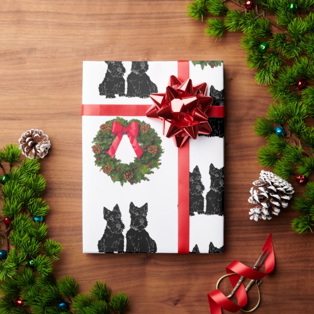 Skotska terrier med julkrans presentpapper (Julgåva)
