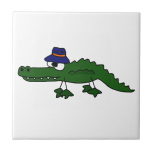 Skraj alligator som ha på sig fiskehatttecknaden kakelplatta