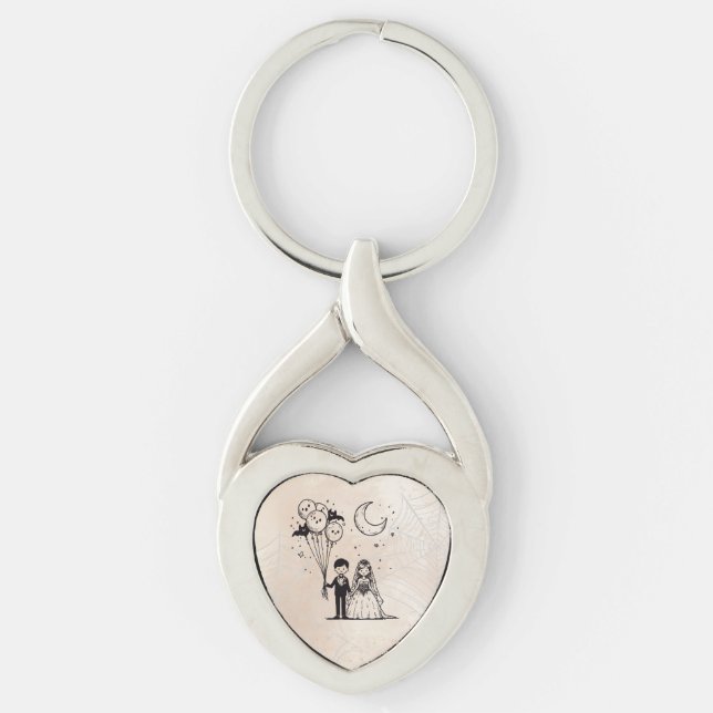 Skrämmande litet par twisted heart silverfärgad nyckelring (Framsidan)