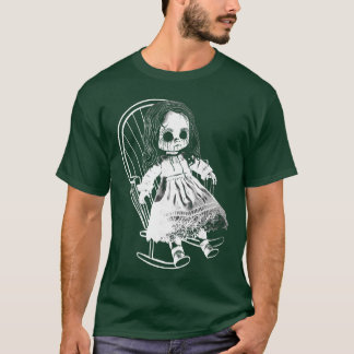 Skrämmande mardrömslik hemsk docka sitter i Rocki T Shirt