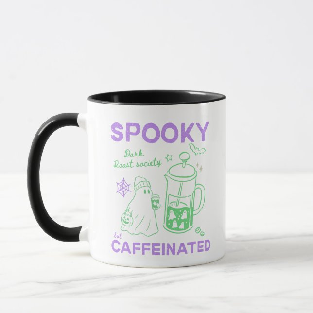 Skrämmande men koffeinsprängd grön violett Hallowe Mugg (Vänster)
