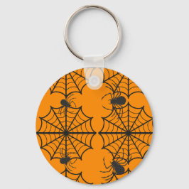 Skrämmande spindelnätshalloween nyckelring