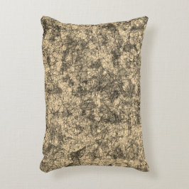 Skrapor upp repor på en lätt fläckig khaki prydnadskudde