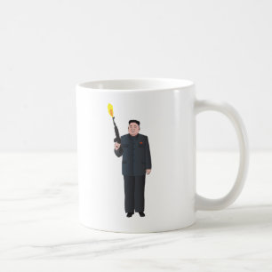 Skratta Kim Jong-un som avfyrar ett vapen in i Kaffemugg