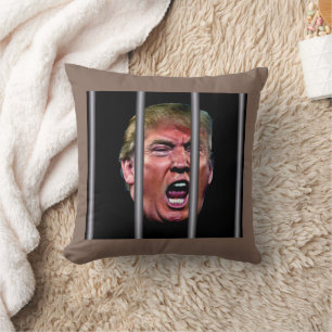 Skrikande, klagande Trump-huvud bakom galler Kudde