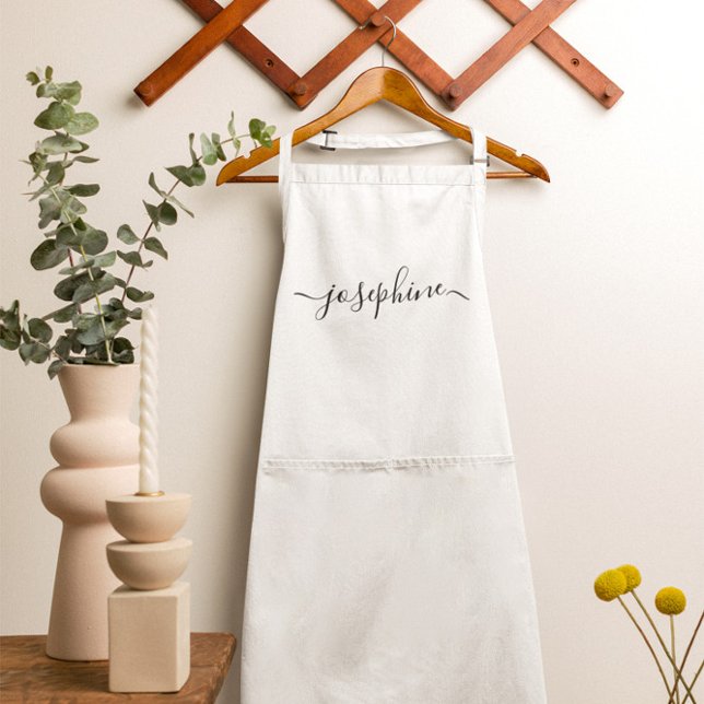 Skript för elegant av personlig, vitt namn förkläde (White Apron with elegant personalized name script. )