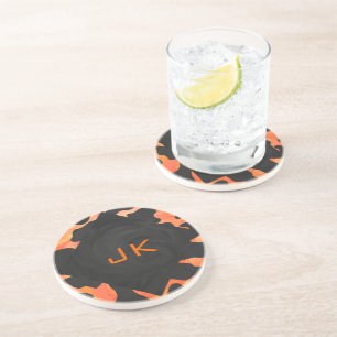 Skriv ut svart och Orange i monogram Underlägg Sandsten