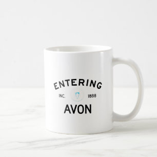 Skrivande in Avon Kaffemugg