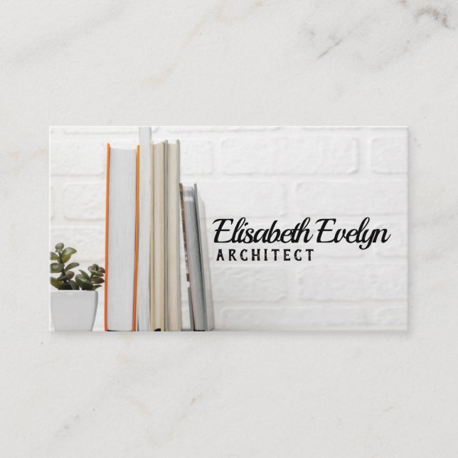 skrivbord med staplad bokar visitkort (Framsida)