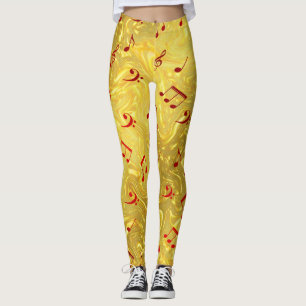 Skrivnoter till guld och röd färgad elegant leggings