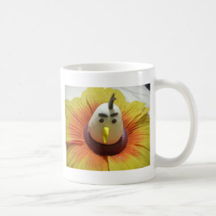 Skuldad fågel i solroskonst kaffemugg