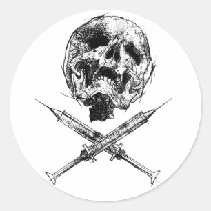 Skull och sprutor runt klistermärke
