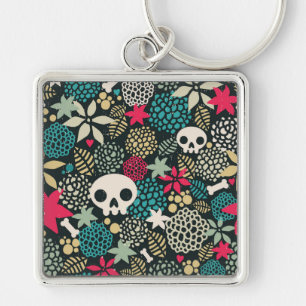 Skull på blommor fyrkantig silverfärgad nyckelring